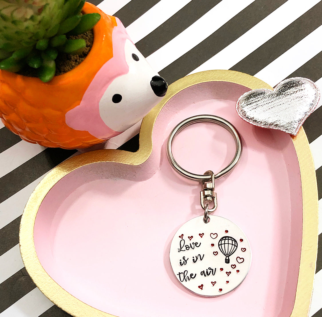 LOVE IS IN THE AIR KEYCHAIN