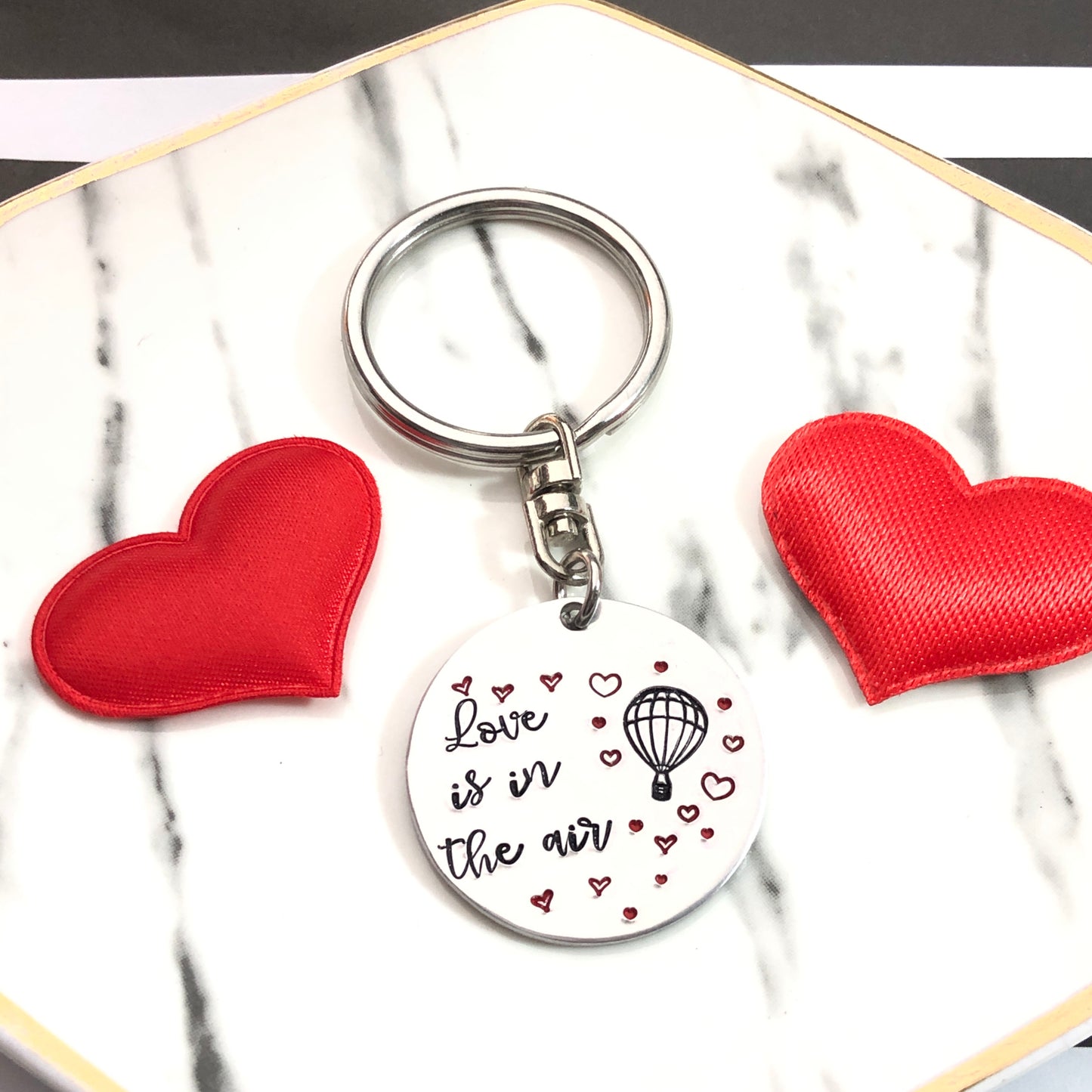 LOVE IS IN THE AIR KEYCHAIN