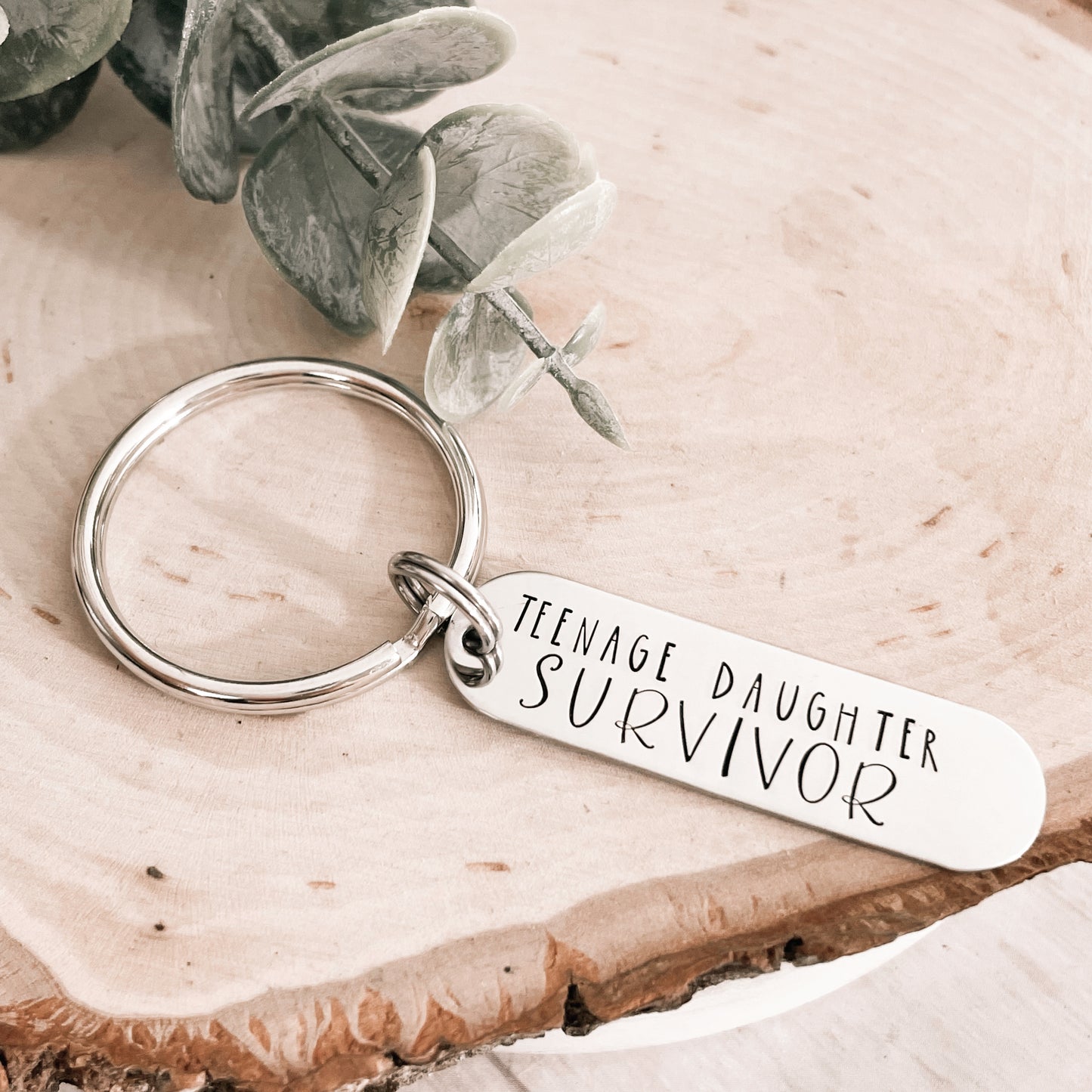 TEENAGE DAUGHTER SURVIVOR-KEYCHAIN