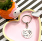 LOVE IS IN THE AIR KEYCHAIN