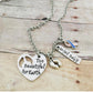 GOD HAS YOU IN HIS ARMS HEART NECKLACE